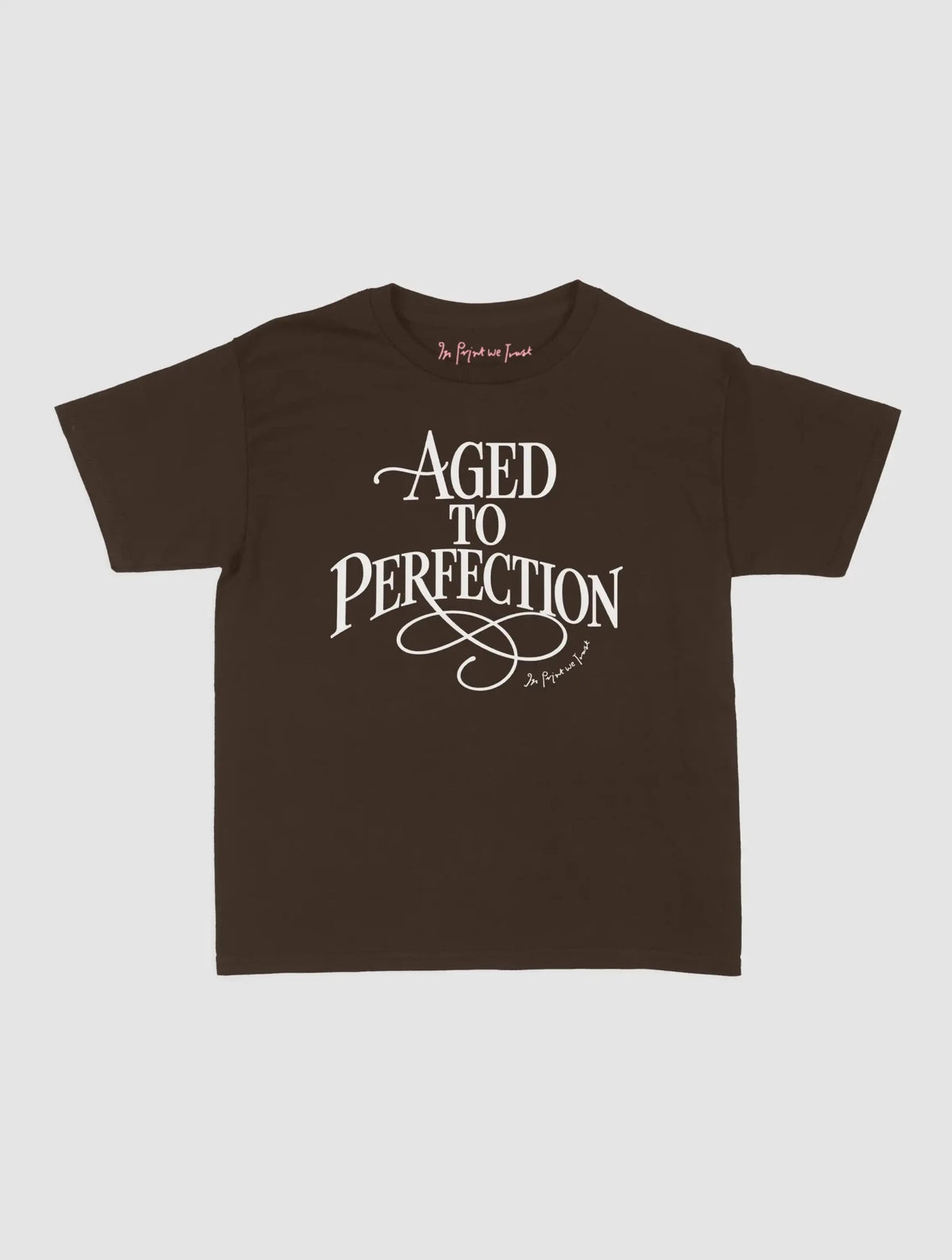 aged to perfection baby tee - In Print We Trust