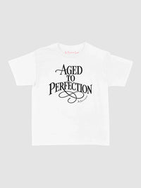 aged to perfection baby tee - In Print We Trust