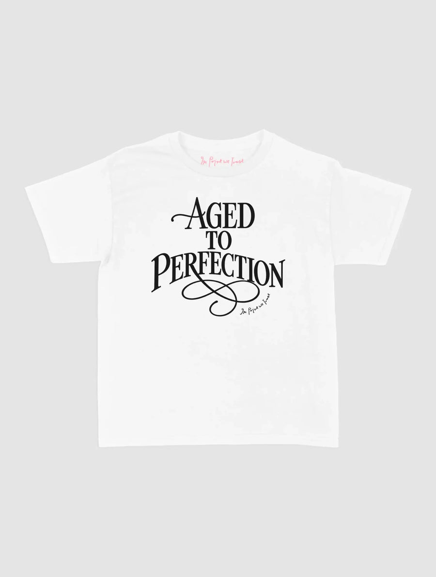 aged to perfection baby tee - In Print We Trust