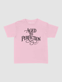 aged to perfection baby tee - In Print We Trust