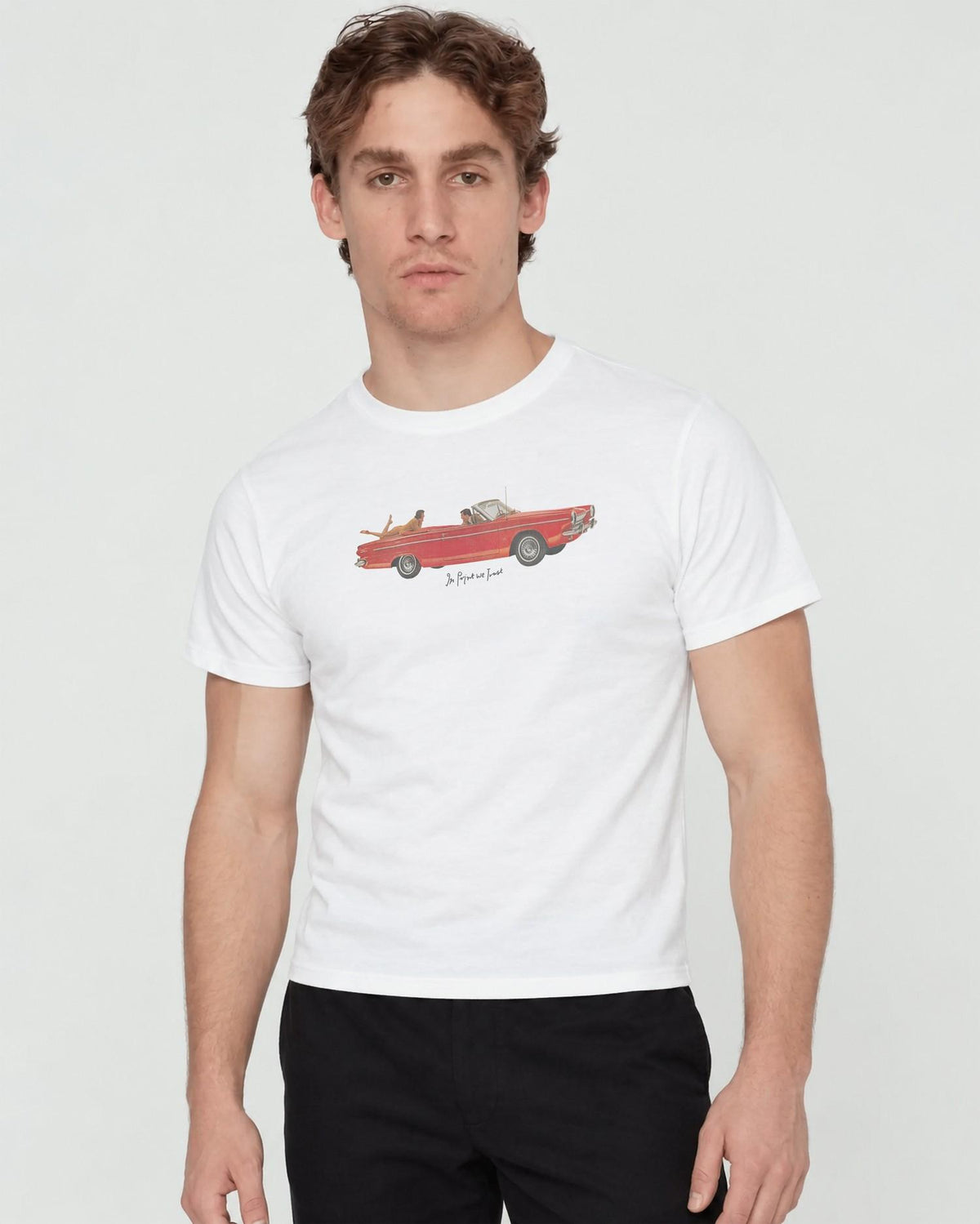 drop top baby tee worn by male model - In Print We Trust