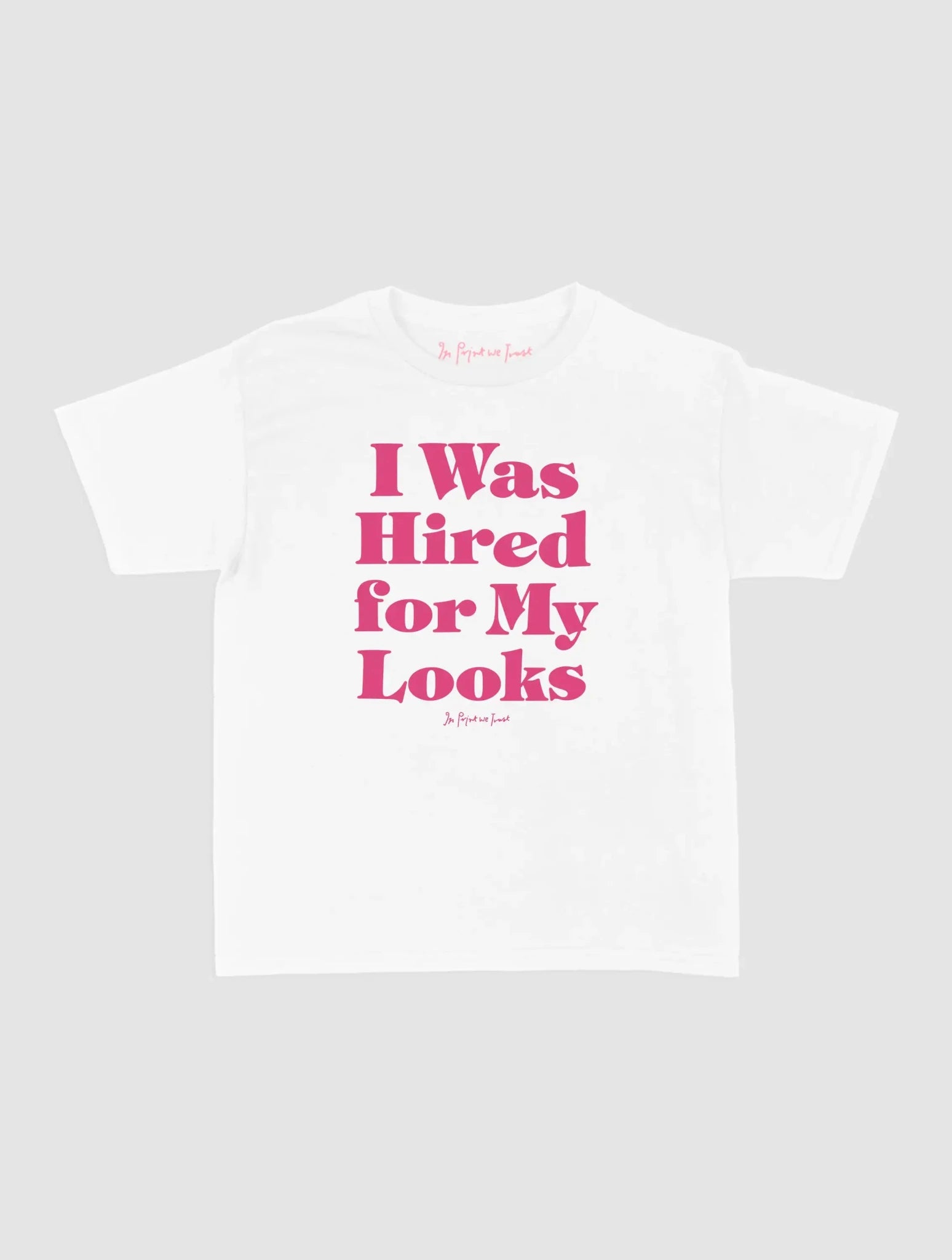 hired for my looks baby tee - In Print We Trust