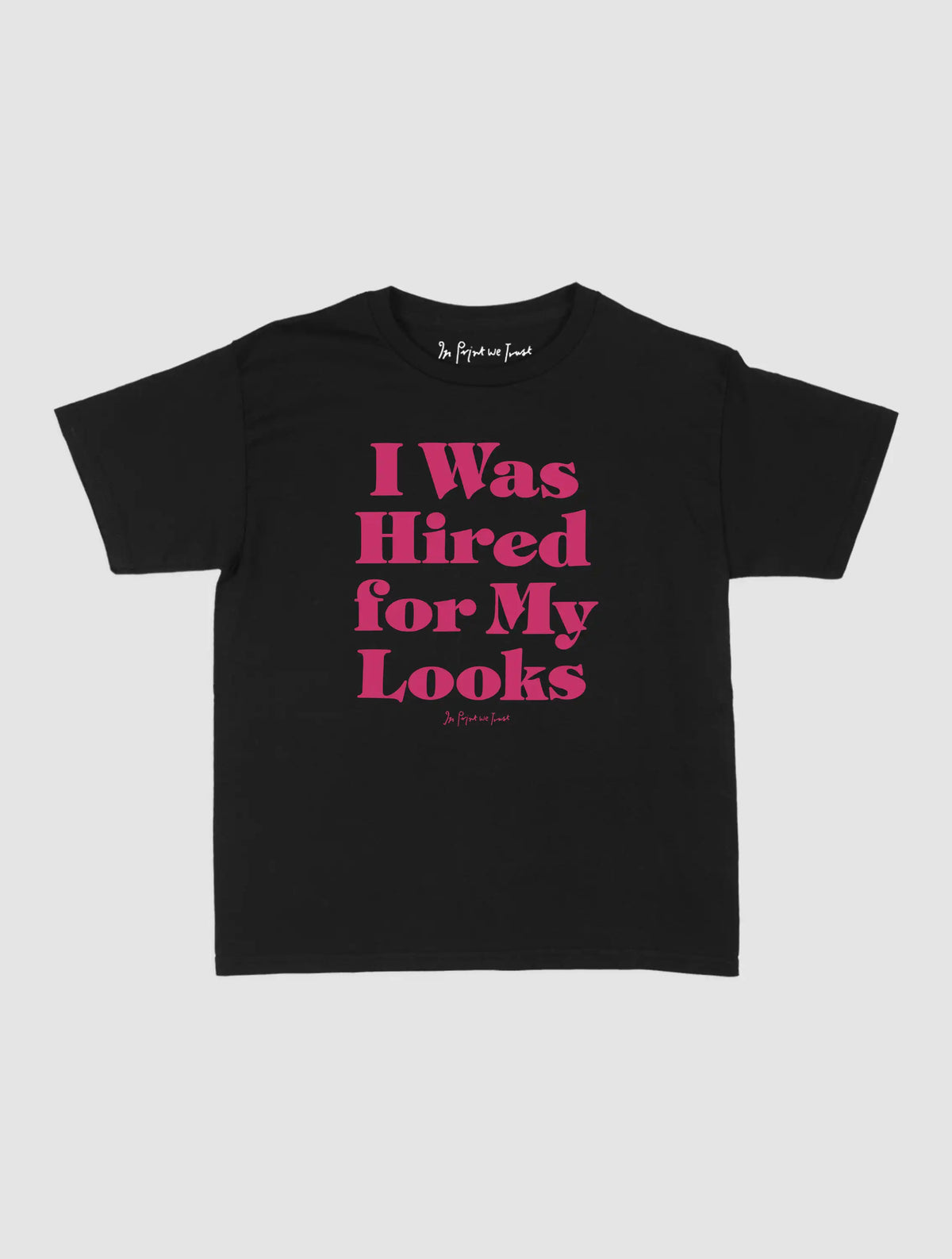 hired for my looks baby tee