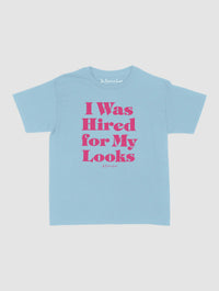 hired for my looks baby tee