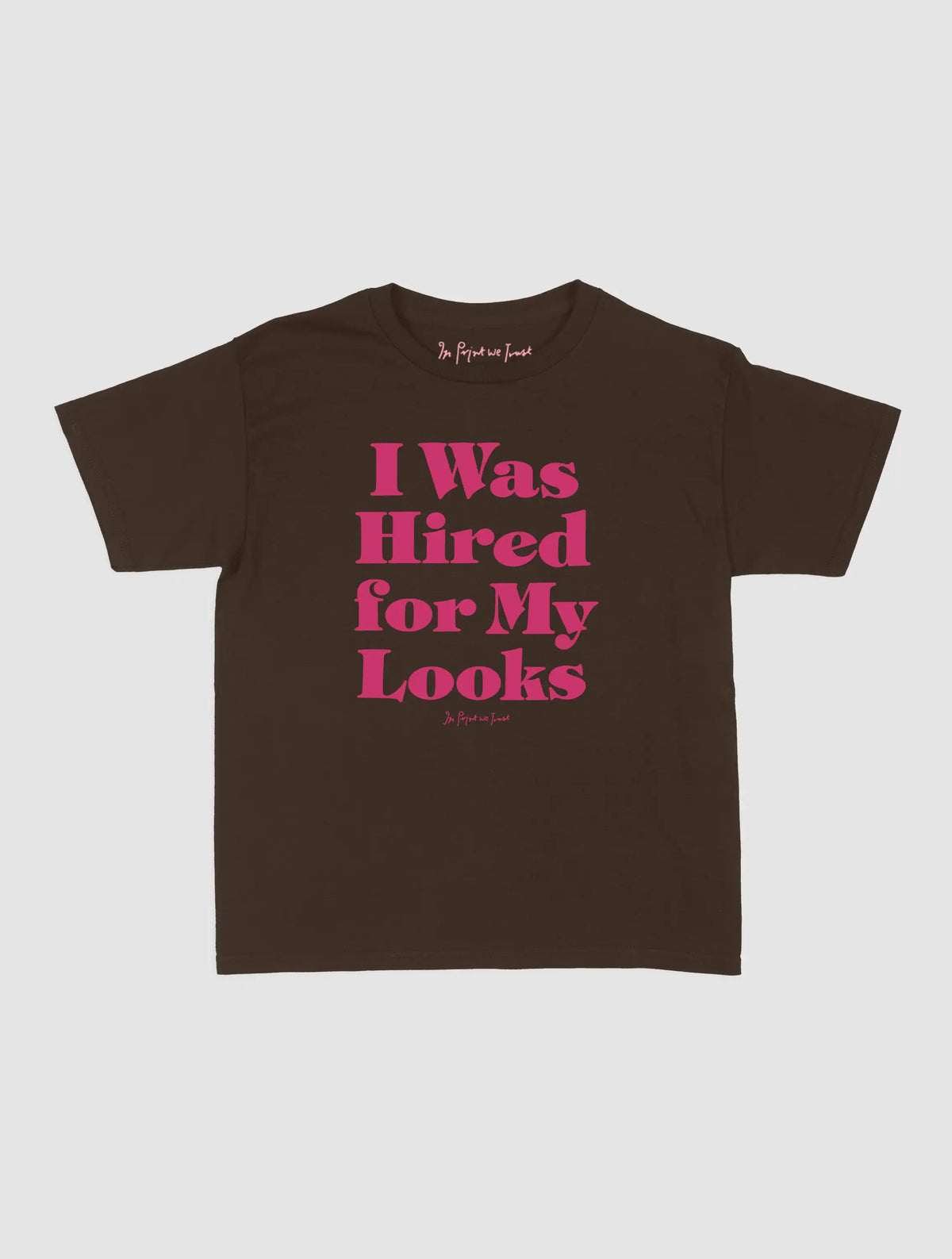 hired for my looks baby tee