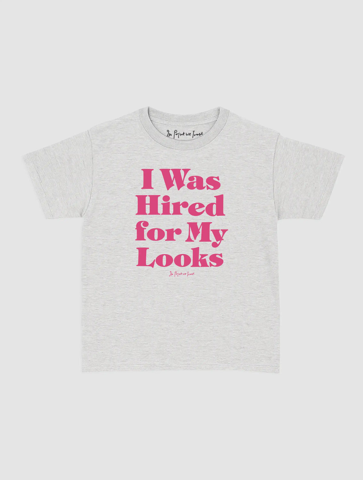 hired for my looks baby tee