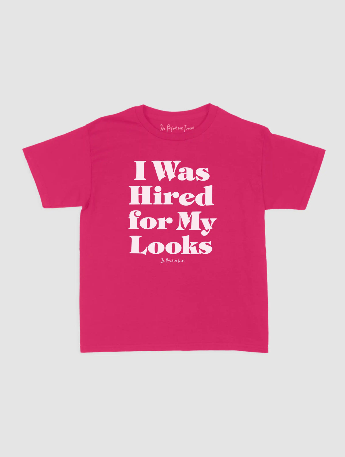 hired for my looks baby tee