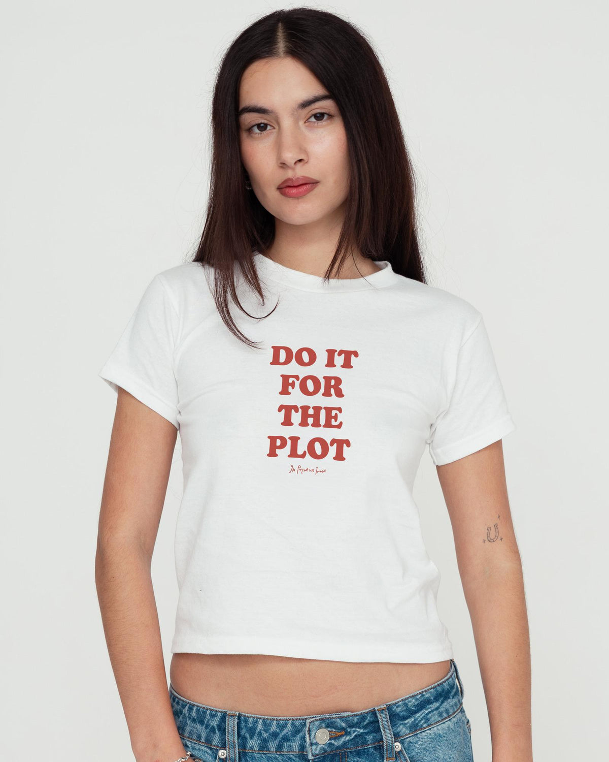 for the plot baby tee - In Print We Trust