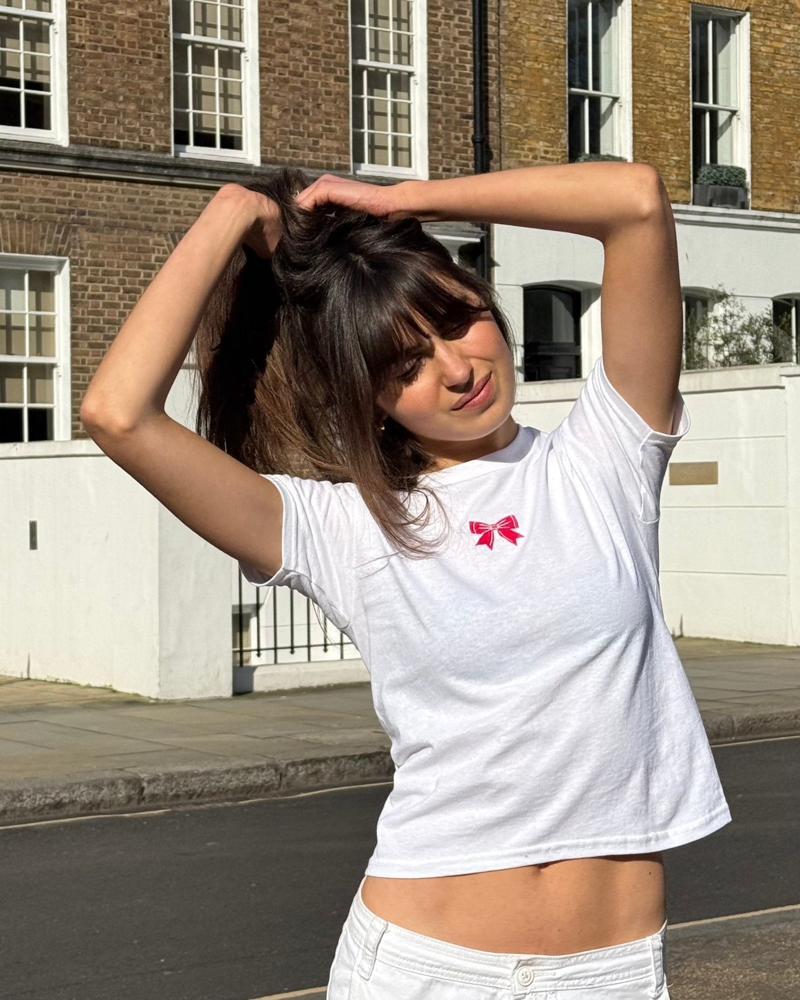 put a bow on it embroidered baby tee - In Print We Trust