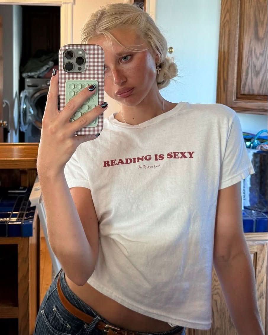 reading is sexy baby tee · In Print We Trust