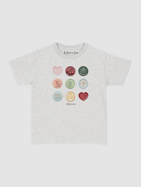 sealed with a kiss baby tee - In Print We Trust