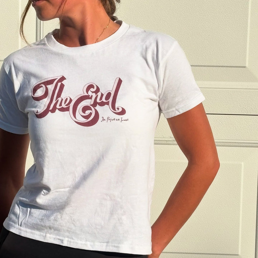 the end baby tee - In Print We Trust