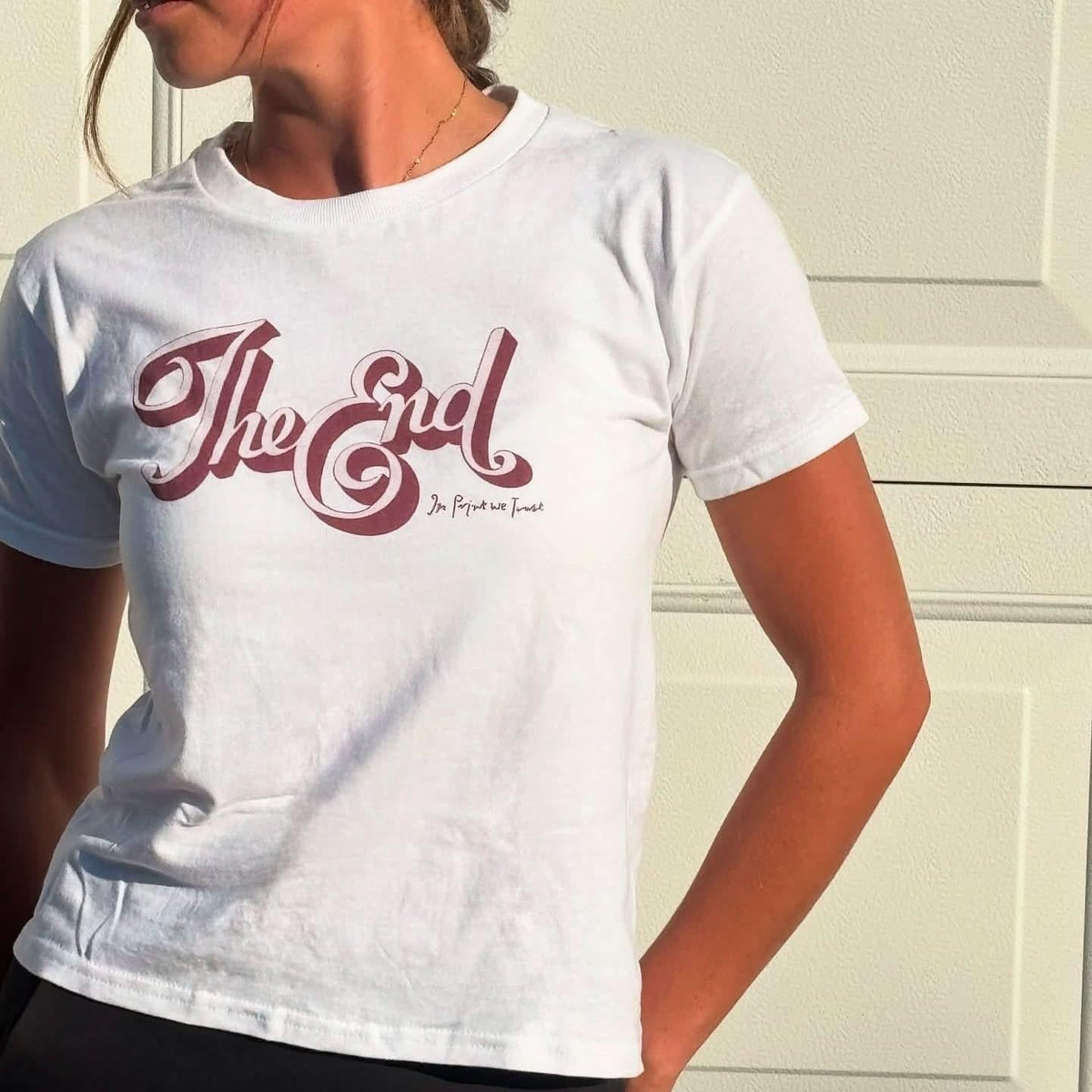 the end baby tee - In Print We Trust